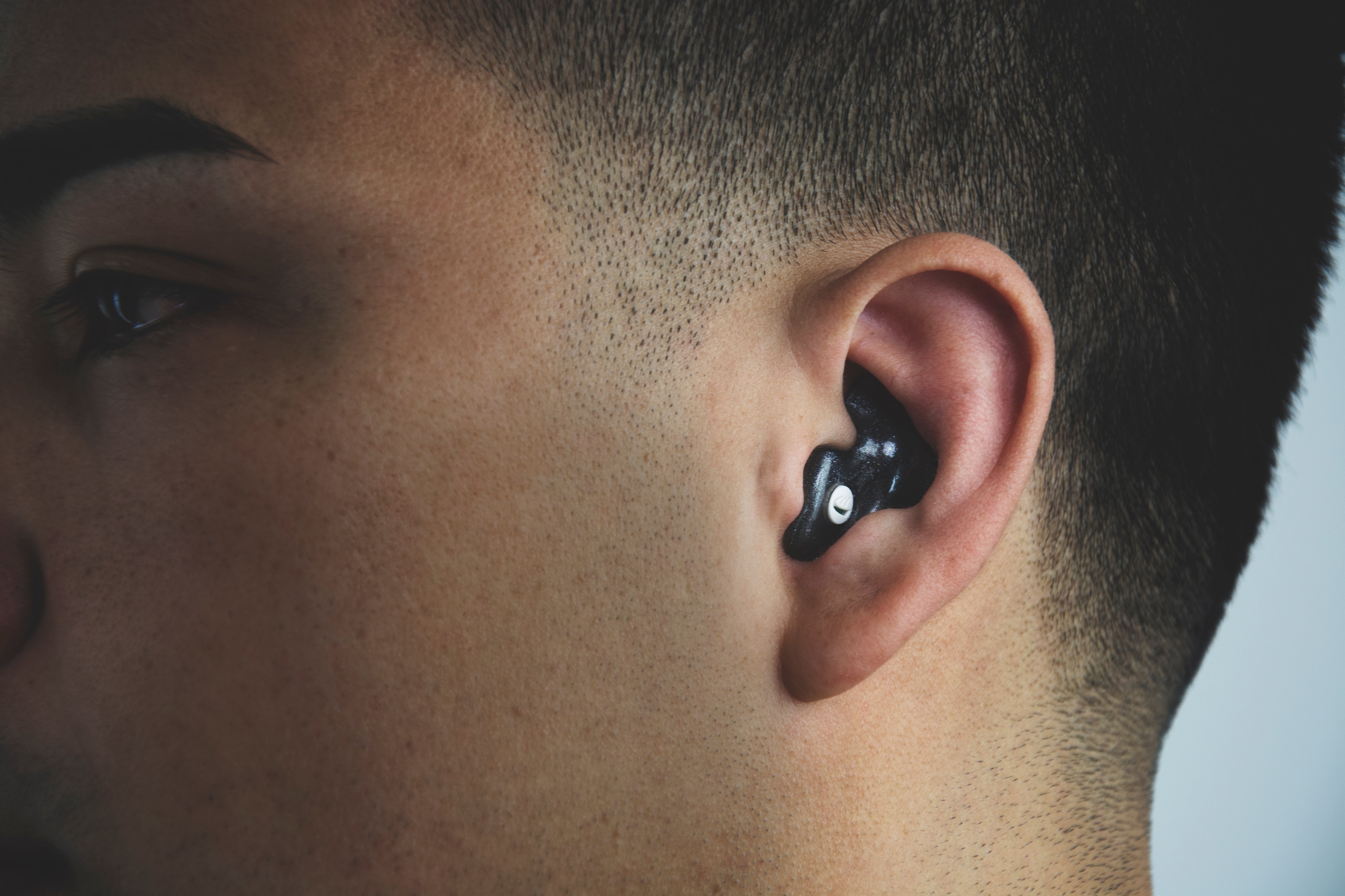 Custom molded earplugs in ear