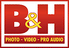 The logo of b&h photo video pro audio, featuring bold red and yellow text with a white outline, and a graphical element resembling a camera lens incorporated in the design.
