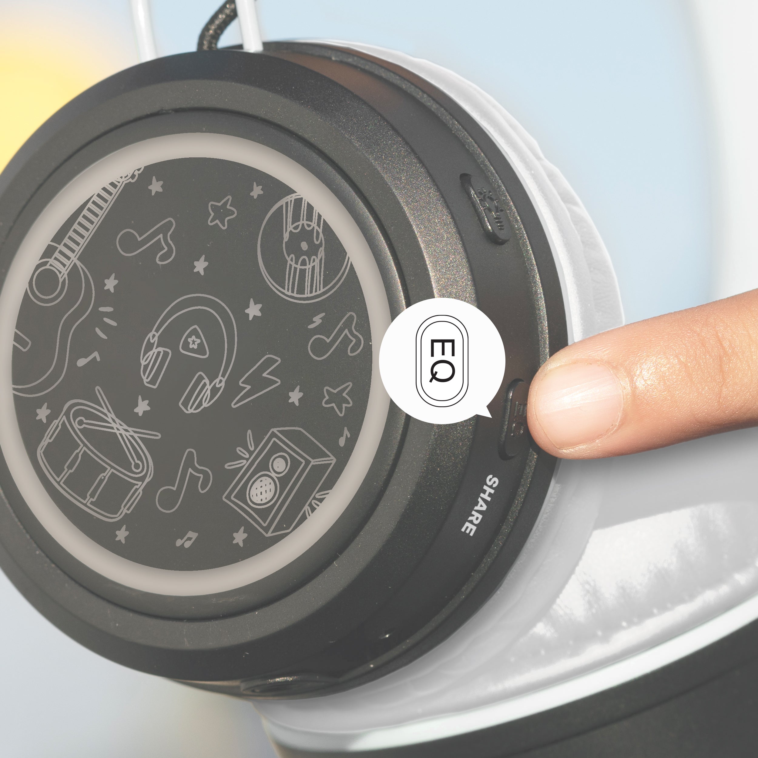 Close-up of a person adjusting the EQ control on a pair of MEE audio KidJamz Share Bluetooth Wireless Headphones for Kids with Multipoint, LED Lights, 85dB Volume Limiter, Microphone, 40h battery; Childrens Headset for School/iPhone/iPad/Tablet