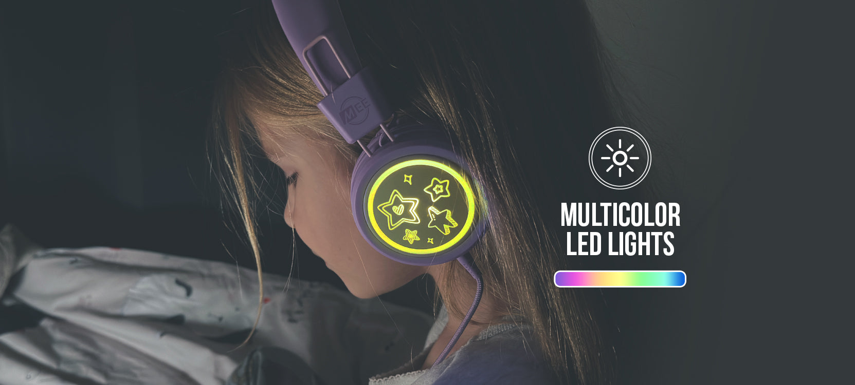A young child with a light-up headphone featuring multicolor led lights, shown in a dimly lit room, emphasizes the glowing earcup with a recycling symbol design.
