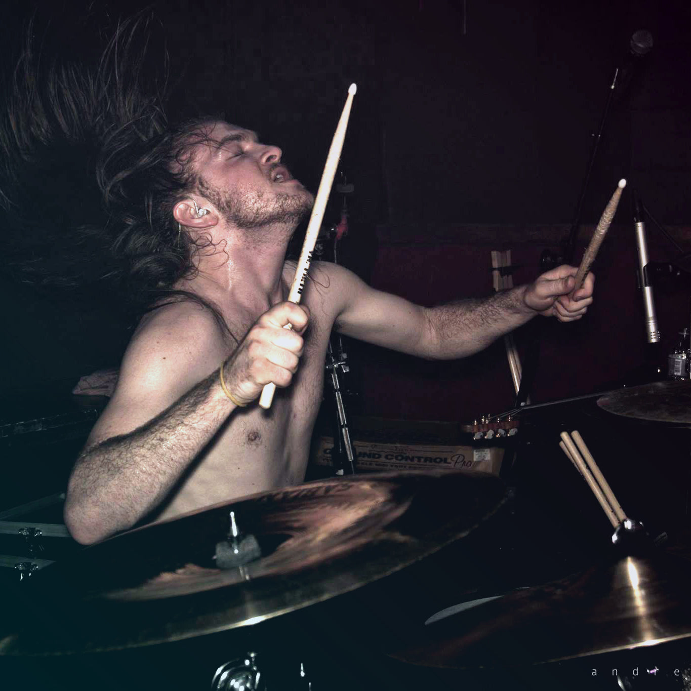 musician wearing the mee audio m6pro in-ear monitors
