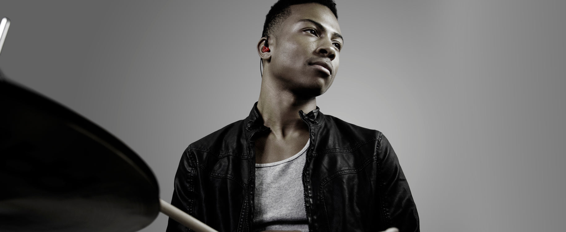 musician wearing the mee audio m6pro in-ear monitors