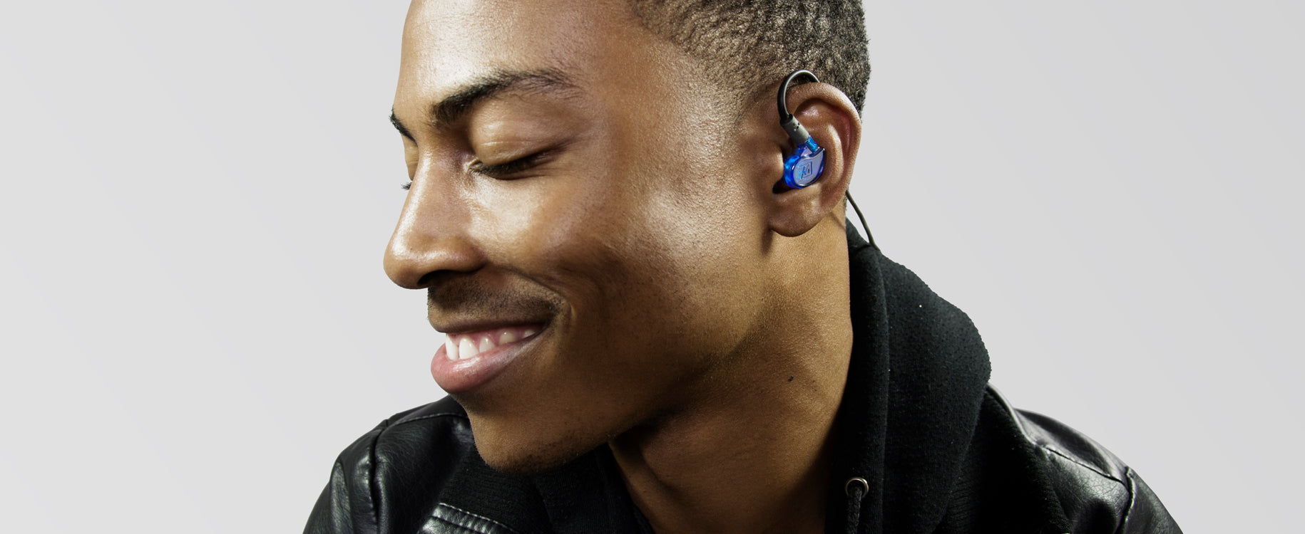 musician wearing the mee audio m6pro in-ear monitors