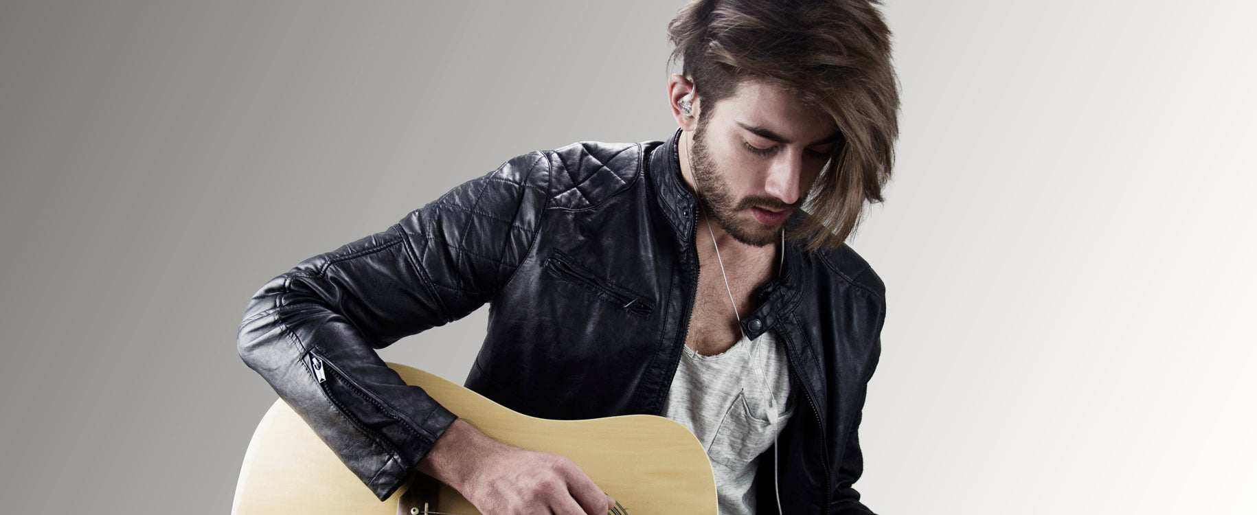 musician wearing the mee audio m6pro in-ear monitors