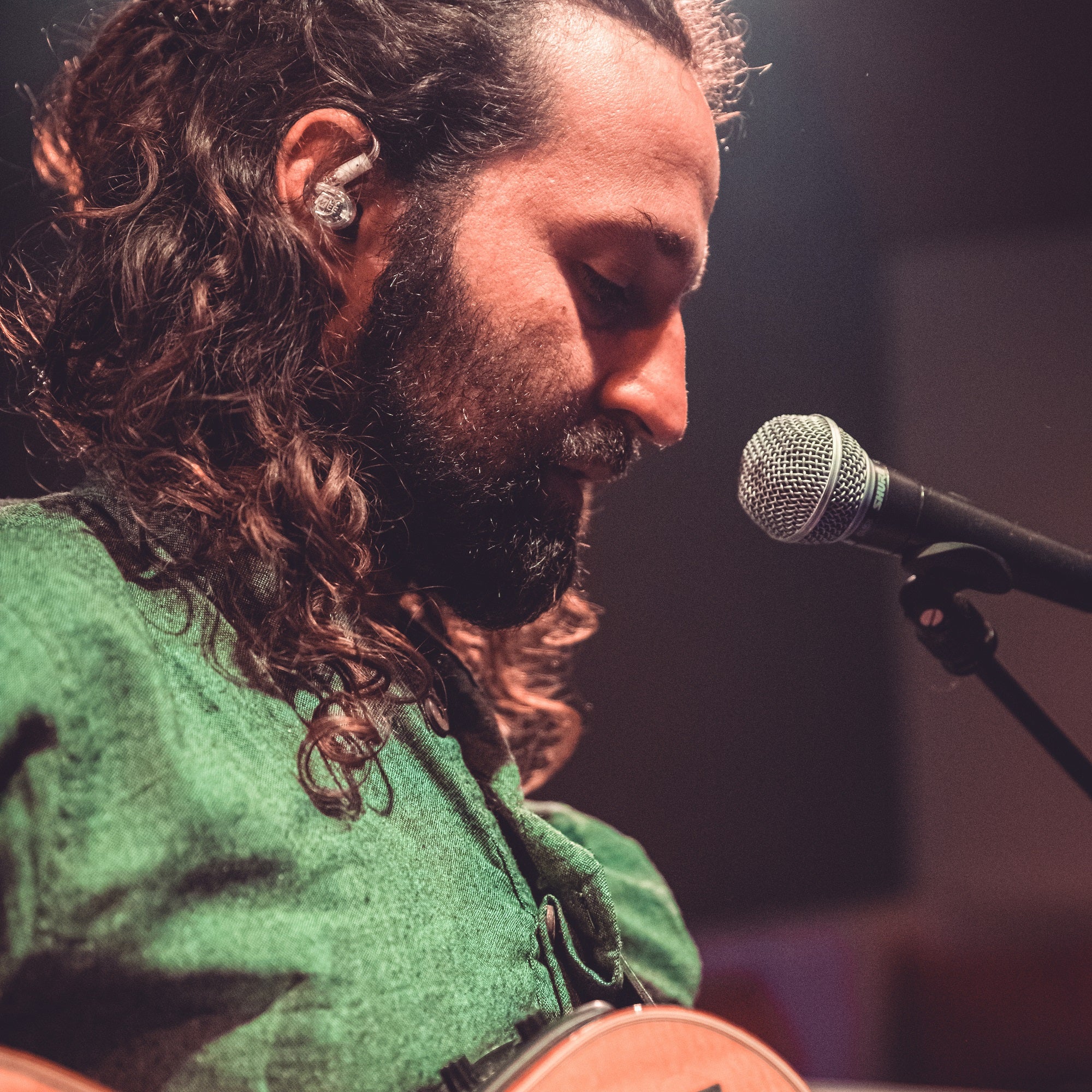 musician with mxpro in-ear monitors