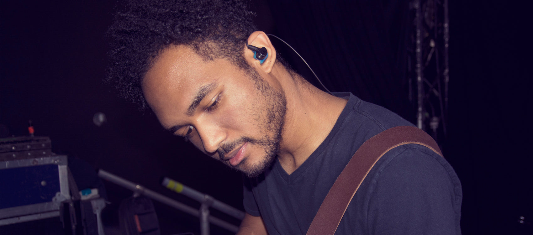 musician with mxpro in-ear monitors