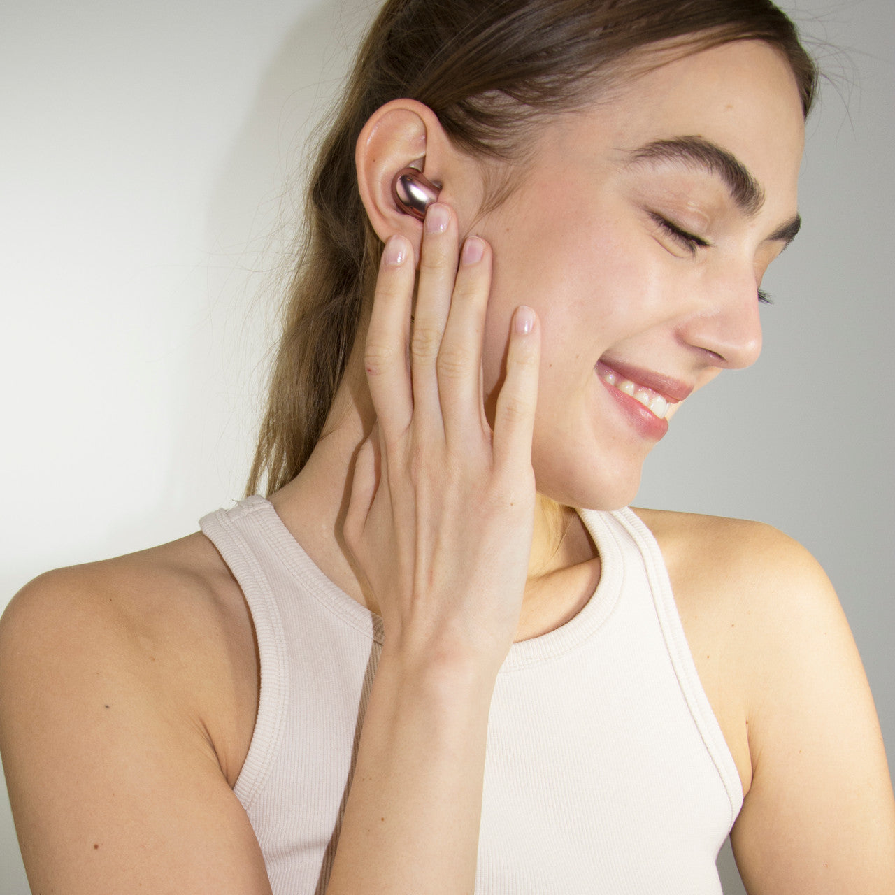 Image of Pebbles Low Profile Wireless Earbuds.