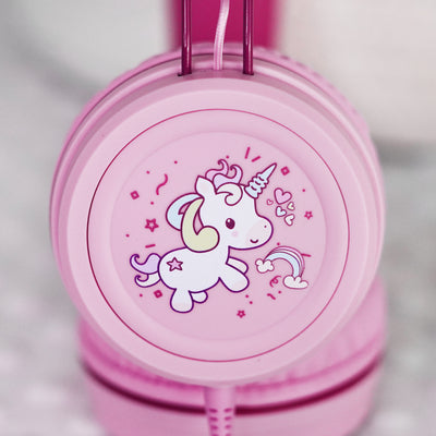 Pink KidJamz KJ55AUX headphones faceplate with a cartoon unicorn design in color on a light gray background 