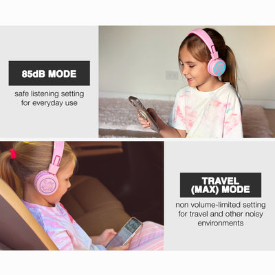 One girl using a Pink KJ55BT KidJamz headphones with a built-in volume limiter to maintain the sound pressure level (SPL) below the recommended 85dB limit, keeping young ears safe and helping build lifelong good listening habits; while the other girl uses the headphones in Travel (MAX) Mode