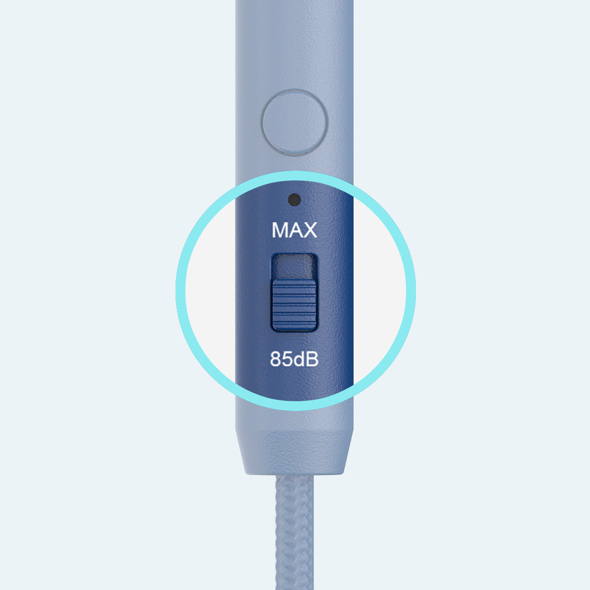 Close-up view of a device, likely a headphone cable, with a volume control feature highlighted by a blue circle indicating a maximum limit of 85 decibels.
