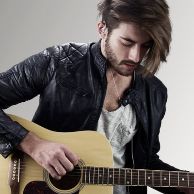 Musician wearing clear M6PRO in-ear monitors