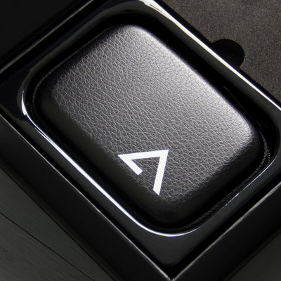 Close-up of a black leather carrying case for P2 earphones