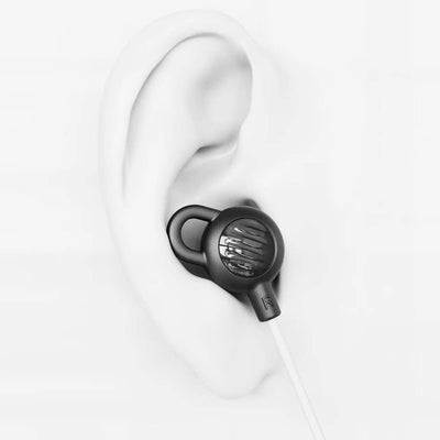 Low-profile Design displayed for SleepTones Sleeping Earbuds with slim earpieces don’t stick out, ensuring an unobtrusive fit even in smaller ears and improved comfort for side sleepers on a white background