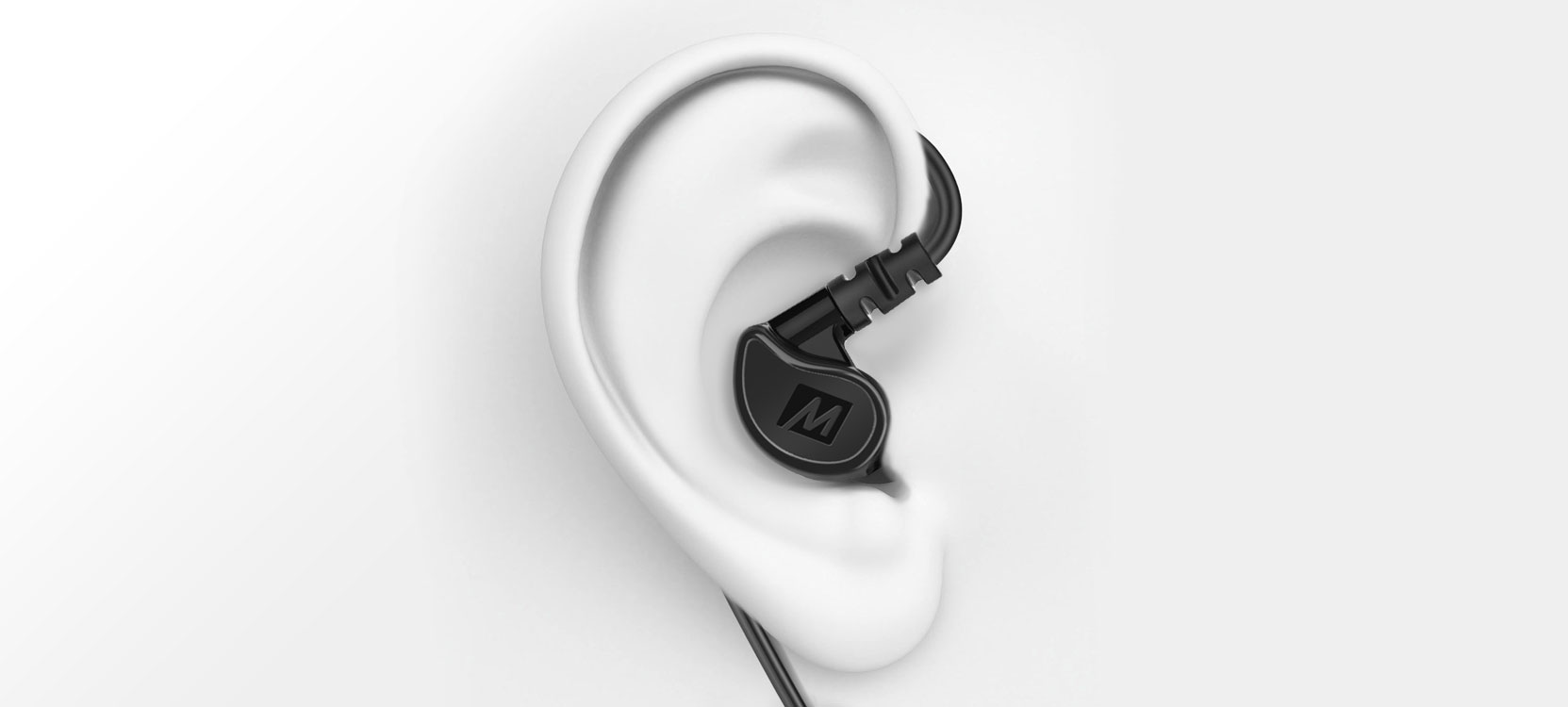 A realistic 3d model of a human ear wearing a small black earpiece with a visible brand initial "m". the background is plain white, emphasizing the earpiece.