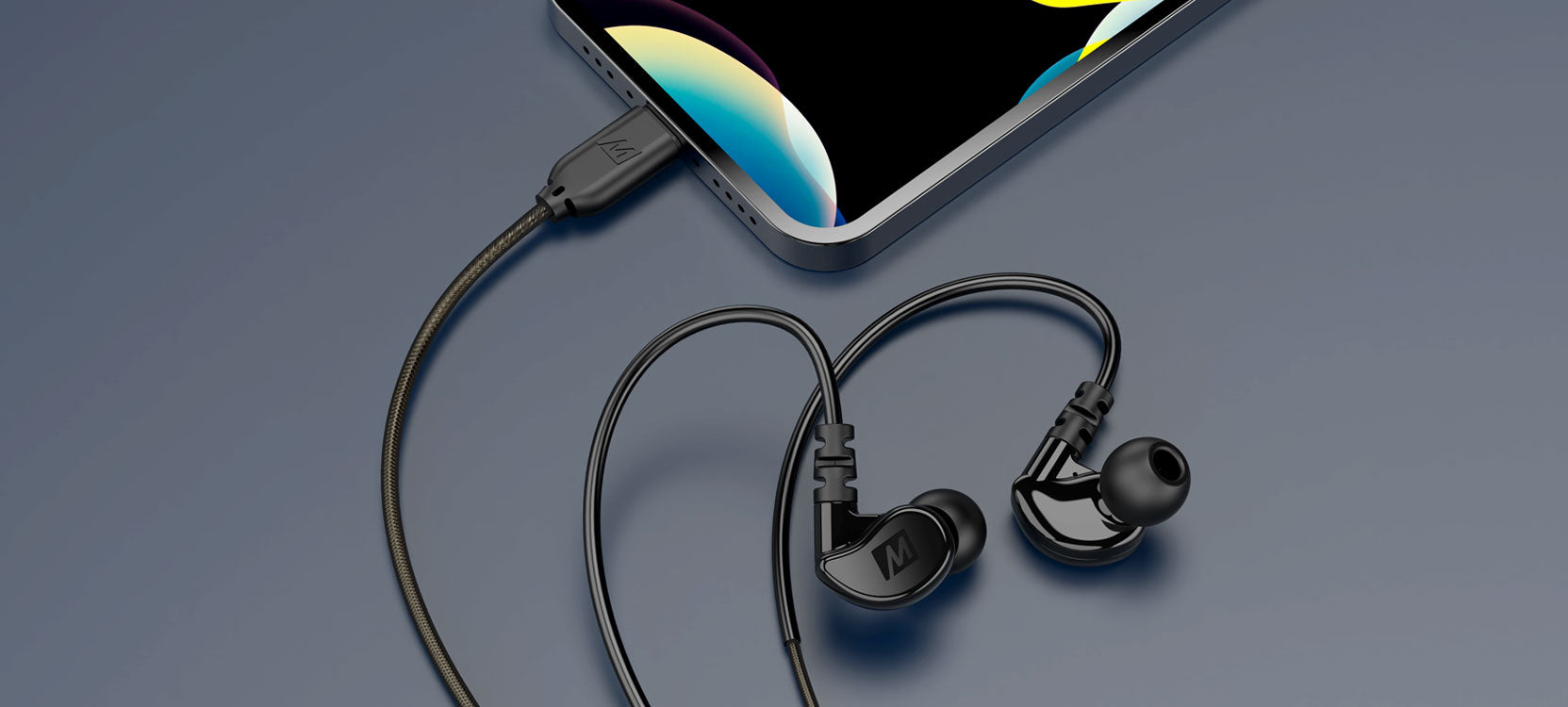 A tablet connected to earphones with flexible ear hooks on a grey background. the focus is on the device and the sleek design of the earphones.