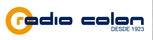 Logo of radio colon featuring stylized lowercase lettering in navy, with an orange circle replacing the 'o' in "colon", and the tagline "desde 1923" below the name.
