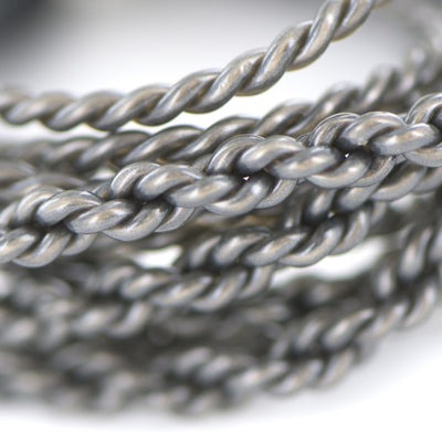 A closeup of Silver-Plated OFC Braided Audio Cable